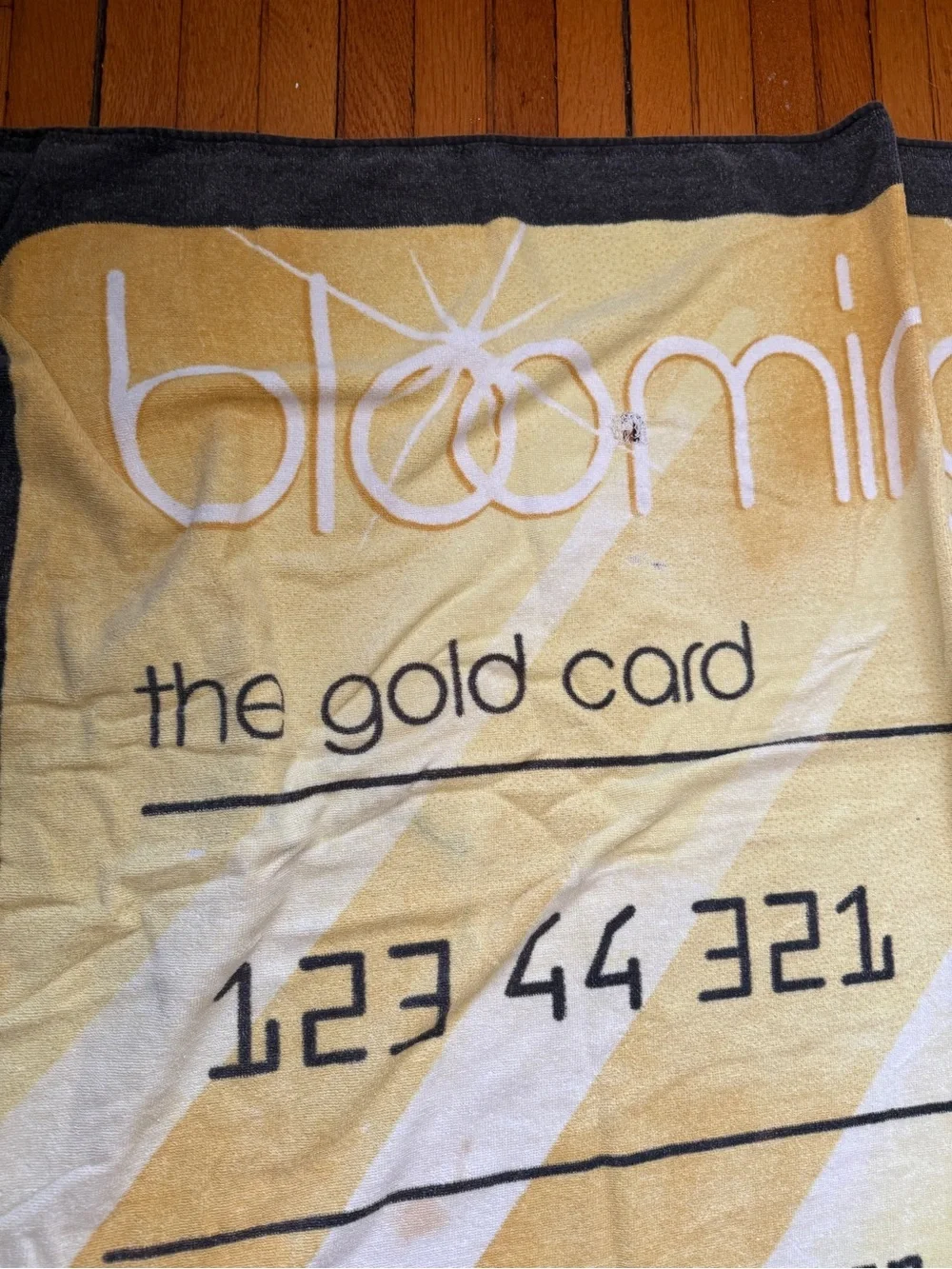 Black & Gold Novelty 'The Gold Card' Beach Towel Bloomingdale’s Linda Knapp name